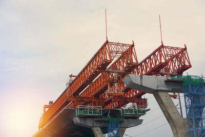 Construction site build electric train rail against sky background