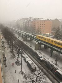 High angle view of train in city during winter