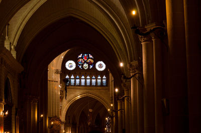 Low angle view of illuminated lights in building