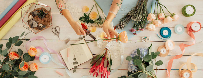 High angle view of various flowers on table