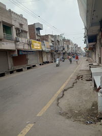 Street amidst buildings in city