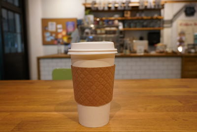 Close-up of coffee cup on table