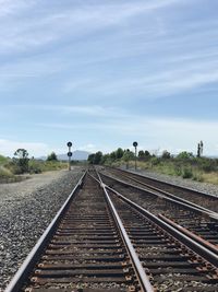 Railway tracks against sky