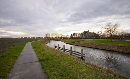 Scenic view of canal in countryside