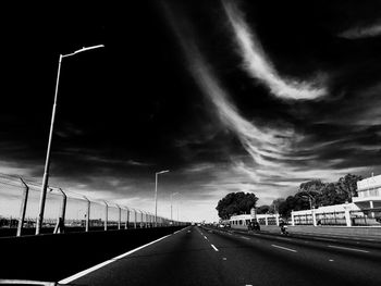 Road against cloudy sky