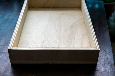 High angle view of wooden box on table