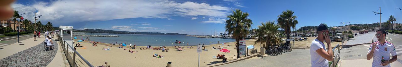 Panoramic view of people on beach