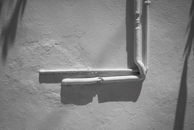 Close-up of pipe on wall