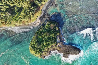 High angle view of surf on shore