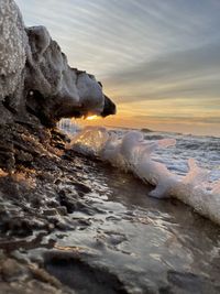 Scenic view of sea against sky during sunset