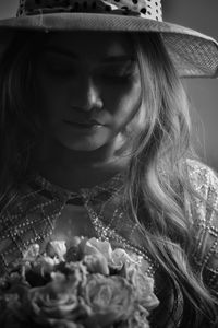 Portrait of young woman in hat