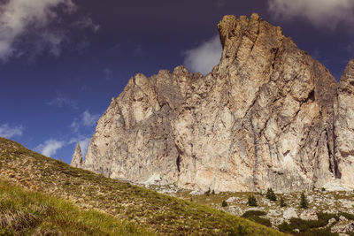 Low angle view of rocks against sky