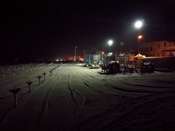 Illuminated street lights at night