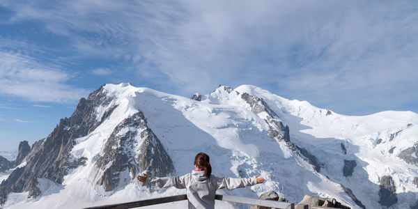 Panoramic view of snowcapped mountains against sky