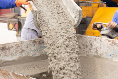 People working on concrete structure