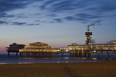 View of illuminated cathedral at beach