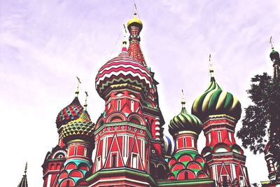 Low angle view of temple against cloudy sky