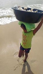 Low section of woman on beach