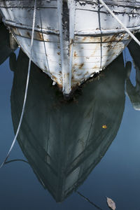 Close-up of boat moored in sea