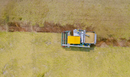 Aerial view of agricultural machinery at farm