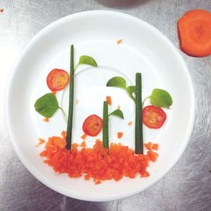 High angle view of fruit salad in plate on table