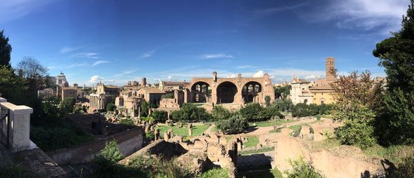 Panoramic view of old buildings against sky