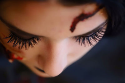 Close-up of teenage girl with halloween make-up