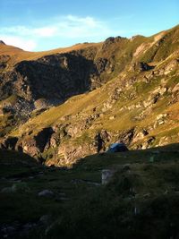 Scenic view of landscape and mountains against sky