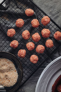 High angle view of meat on barbecue grill