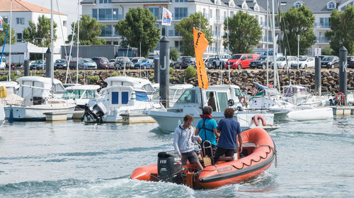 People in boat at sea