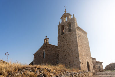 Low angle view of church against clear sky