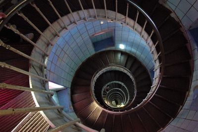 Directly below shot of spiral staircase in building