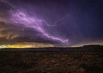 Scenic view of lightning in sky at night