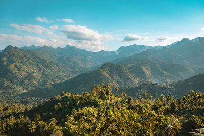 High angle view of townscape and mountains against sky