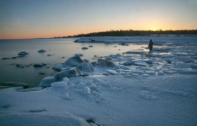 Scenic view of sea against sky during sunset