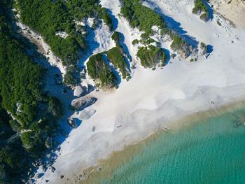 High angle view of sand dunes against sky