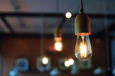 Close-up of illuminated light bulb