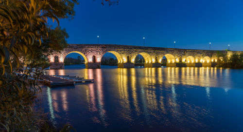 Night view of roman bridge of merida, extremadura. spain