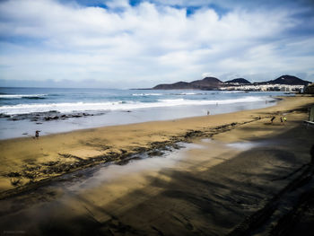 Scenic view of beach against sky