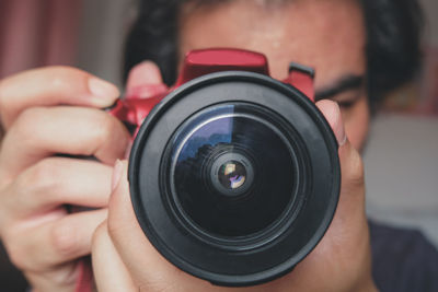 Midsection of man photographing