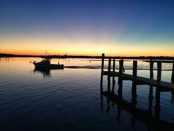 Scenic view of calm sea at sunset