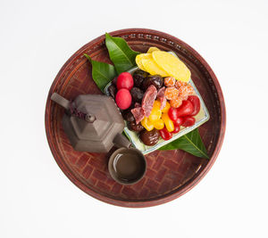 High angle view of breakfast in bowl against white background