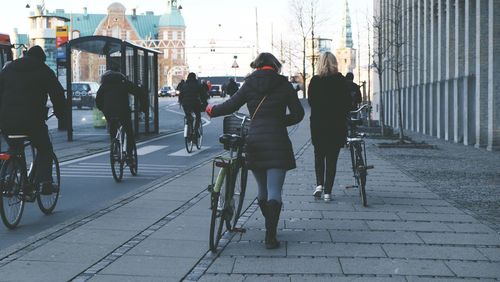People walking on city street
