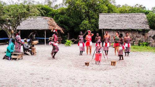 People sitting in front of building