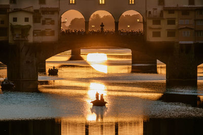 Silhouette of building at sunset