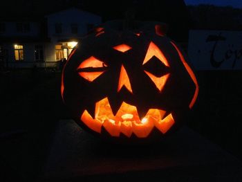 Close-up of illuminated halloween pumpkin at night
