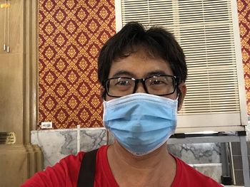 Portrait of man wearing mask