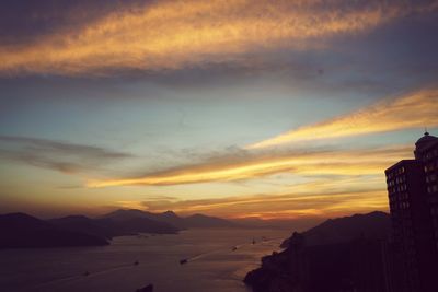 View of sea against cloudy sky during sunset