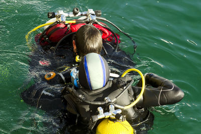 People snorkeling in sea