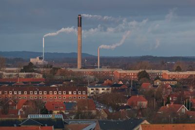 Aerial view of factory against sky